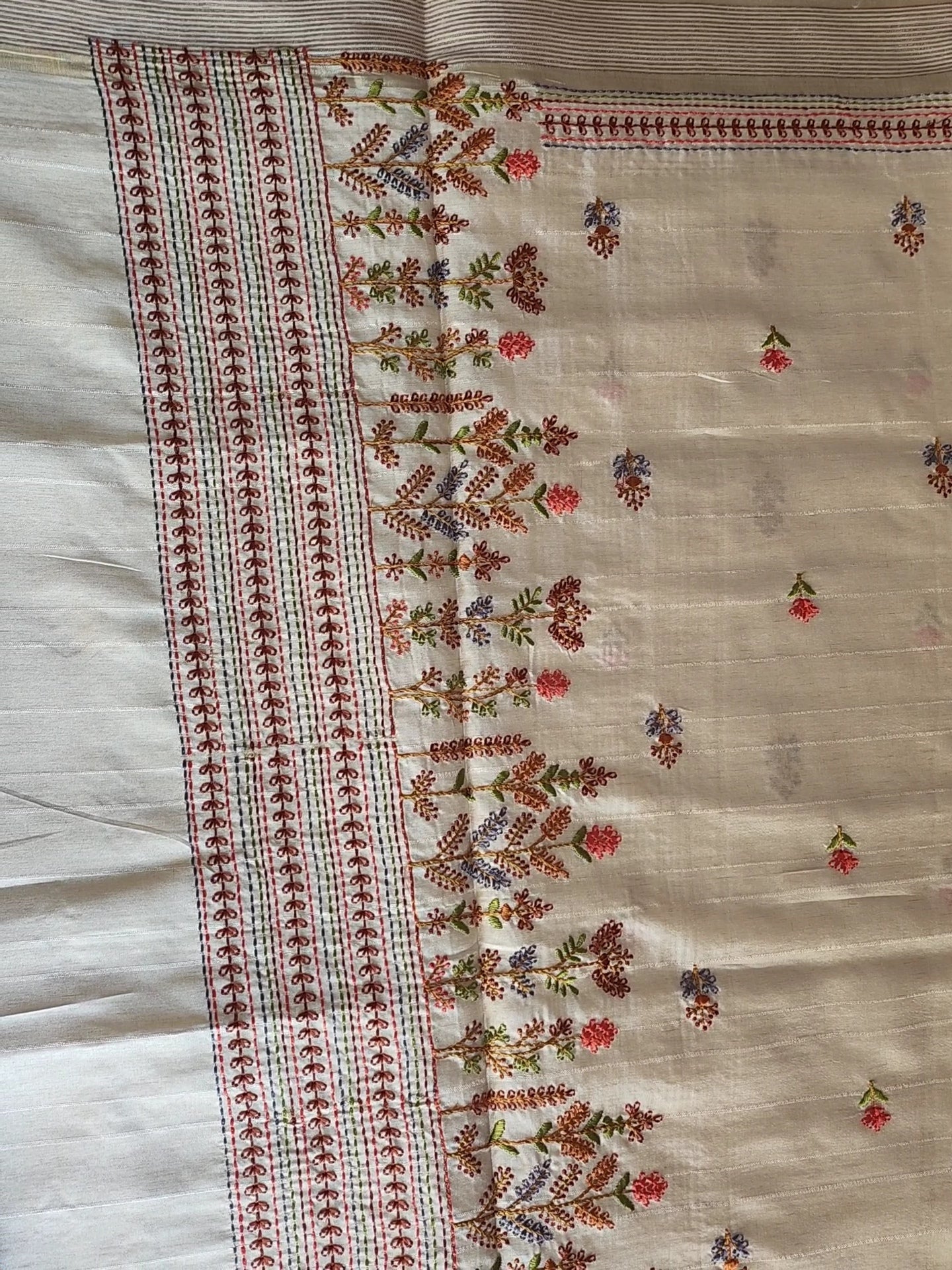 Cream embroidered semi silk saree