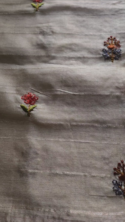 Cream embroidered semi silk saree