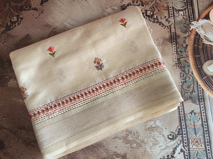 Cream embroidered semi silk saree